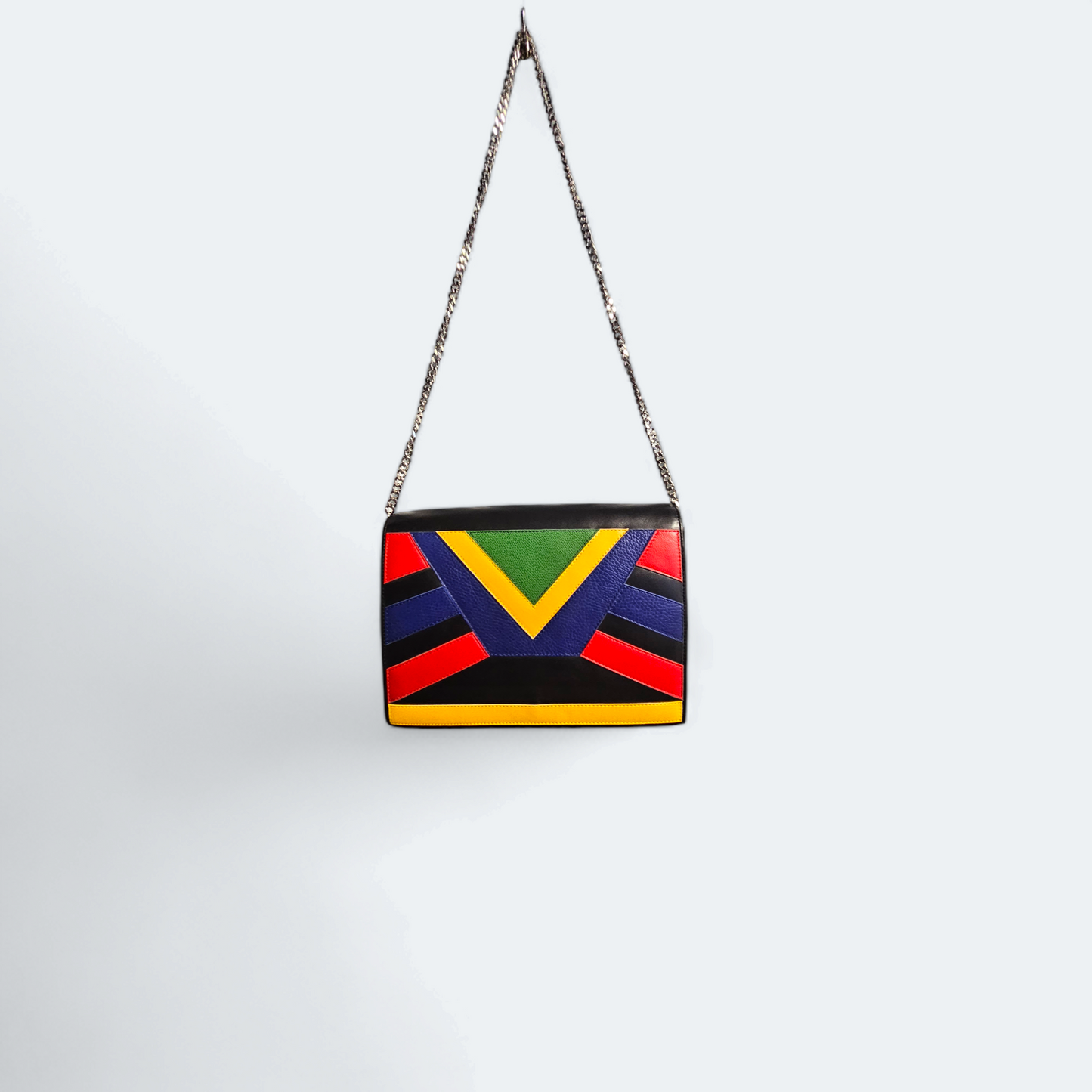Black shoulder bag with geometric patterns