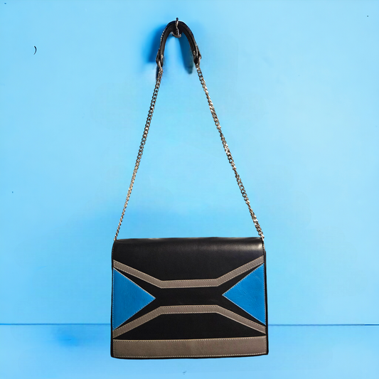 Black shoulder bag with geometric patterns